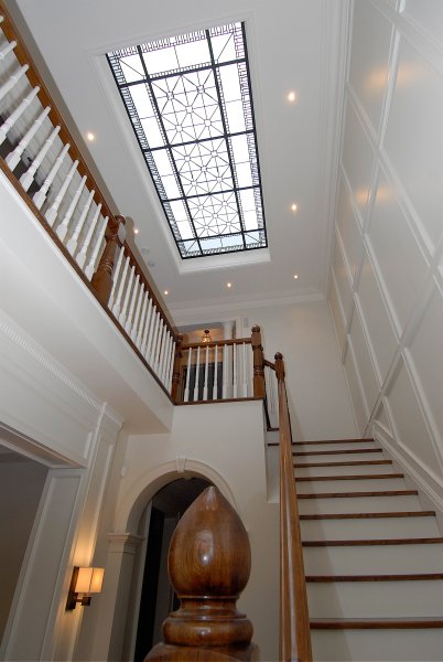 Stained and leaded glass skylight for the center hall and stair of a custom built residence in Toronto